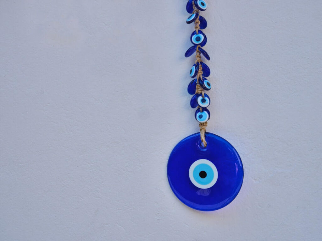 closeup of evil eye charm