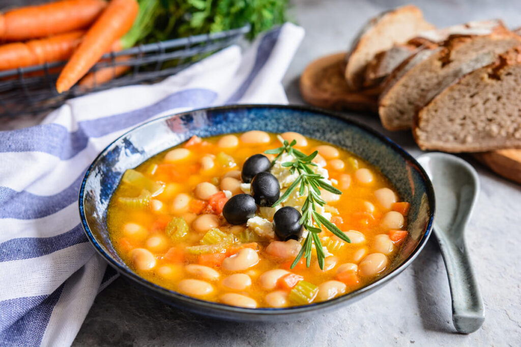 Fasolatha – delicious Greek white bean soup sprinkled with feta cheese