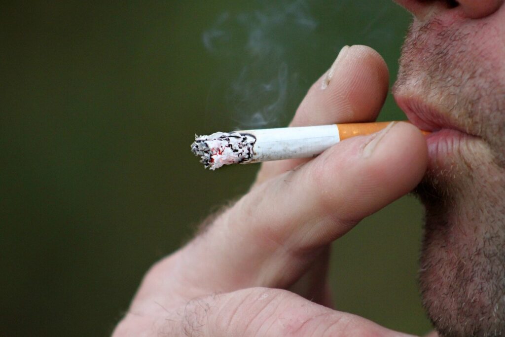 man smoking close up