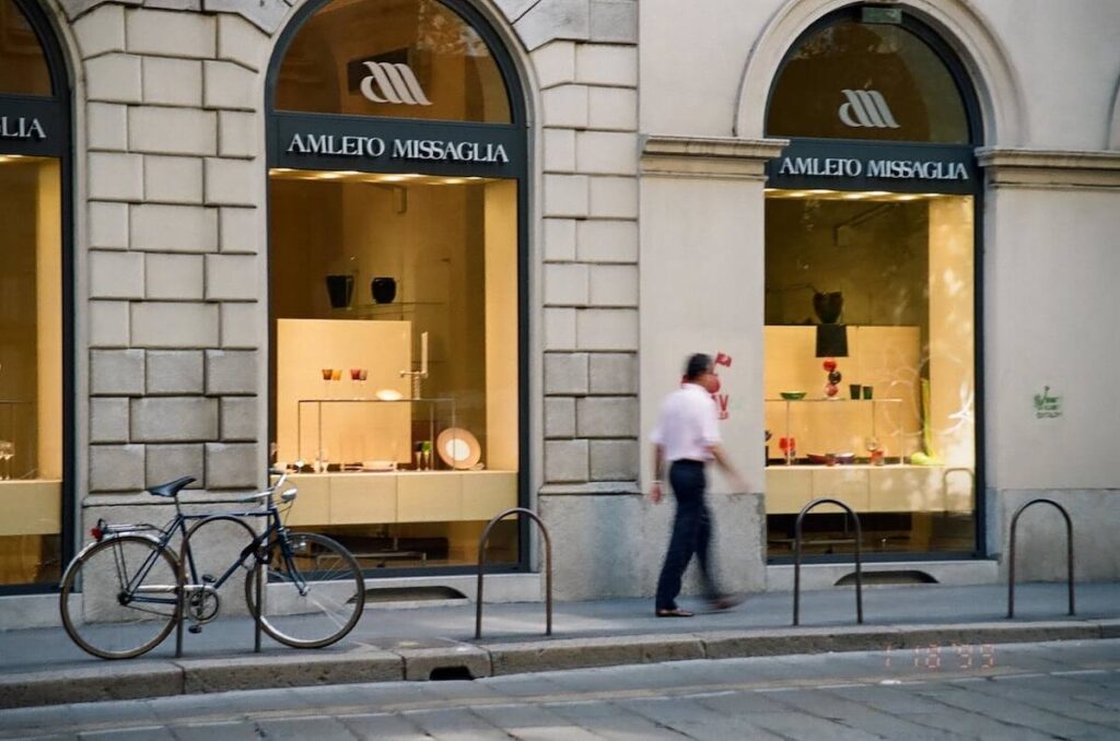 Man walking past Amleto Missaglia Shop