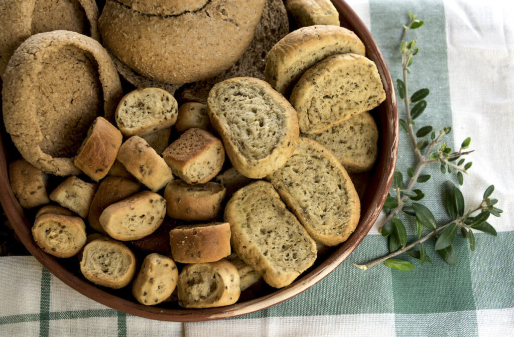 Assorted bread rusks on tablecloth