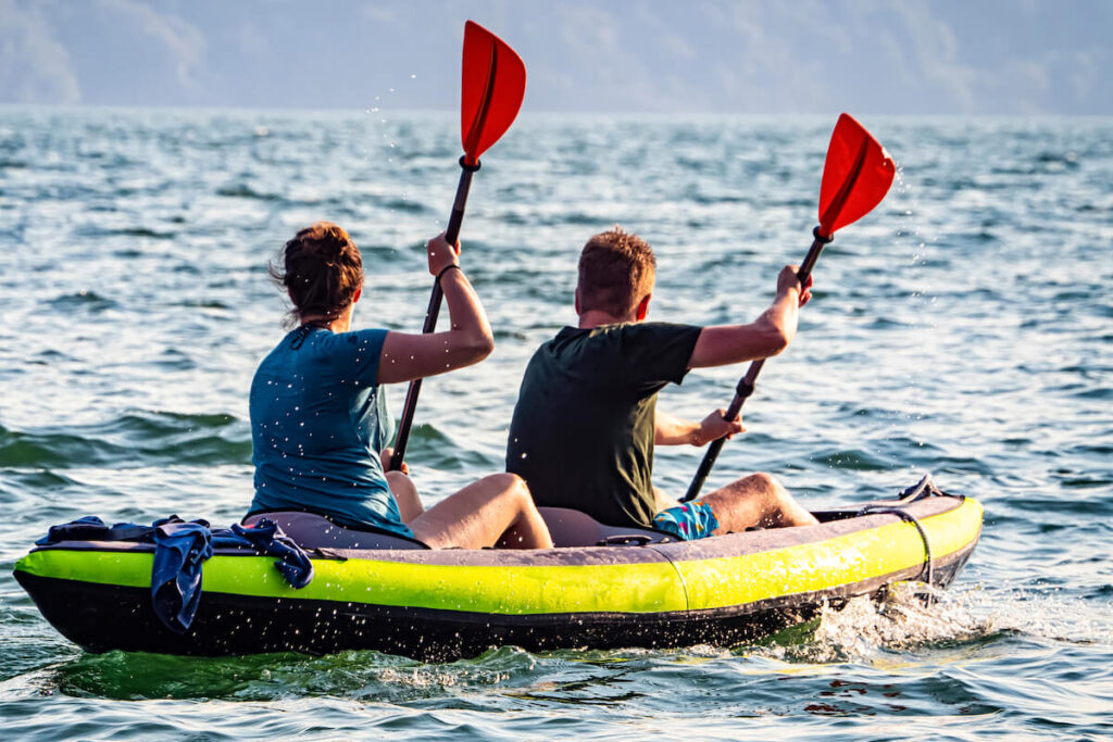 Couple canoeing on Lake Como