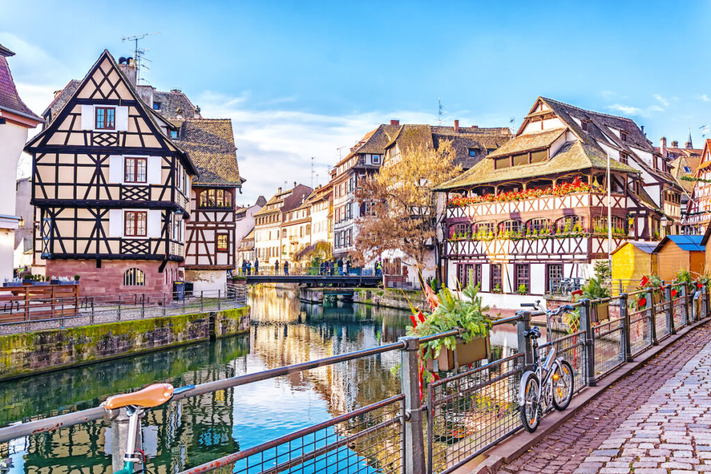Traditional half-timbered houses on picturesque canals in La Petite France in the medieval fairytale town of Strasbourg