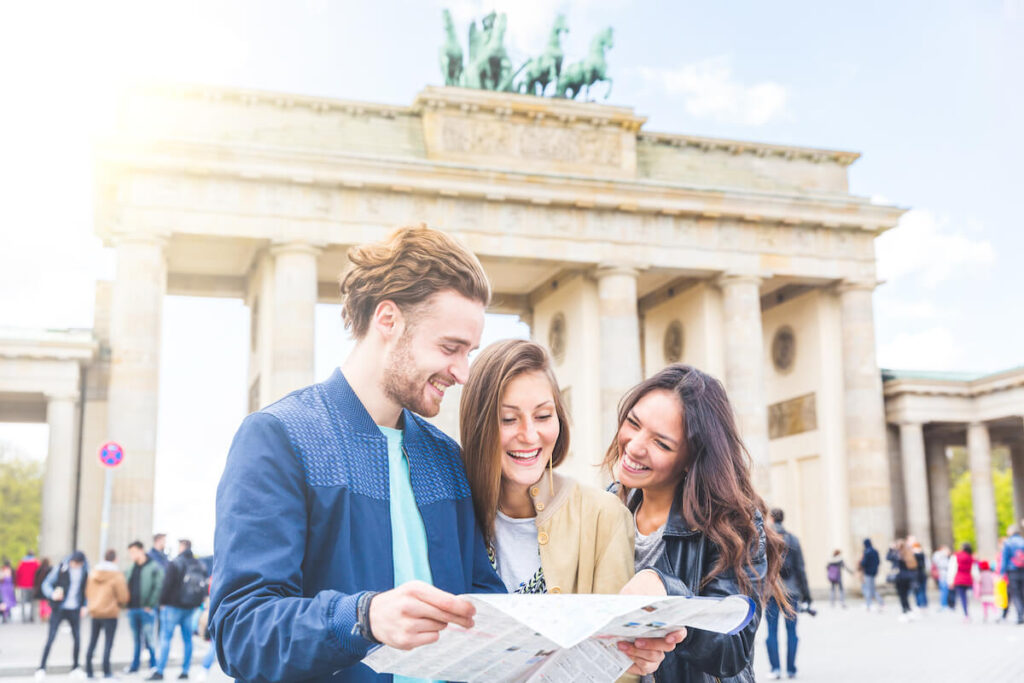 Multiracial group of friends visiting the city of Berlin
