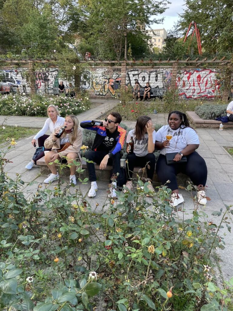 friends enjoying beers outside in Berlin