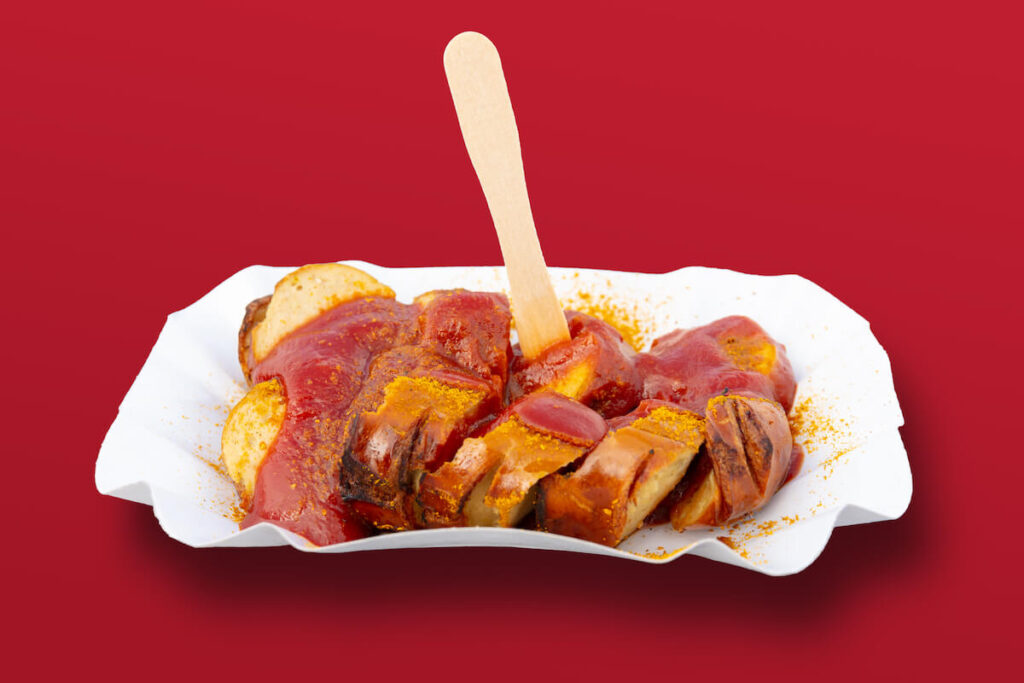 A popular specialty in Germany and Berlin called Currywurst, a grilled sausage with curry sauce