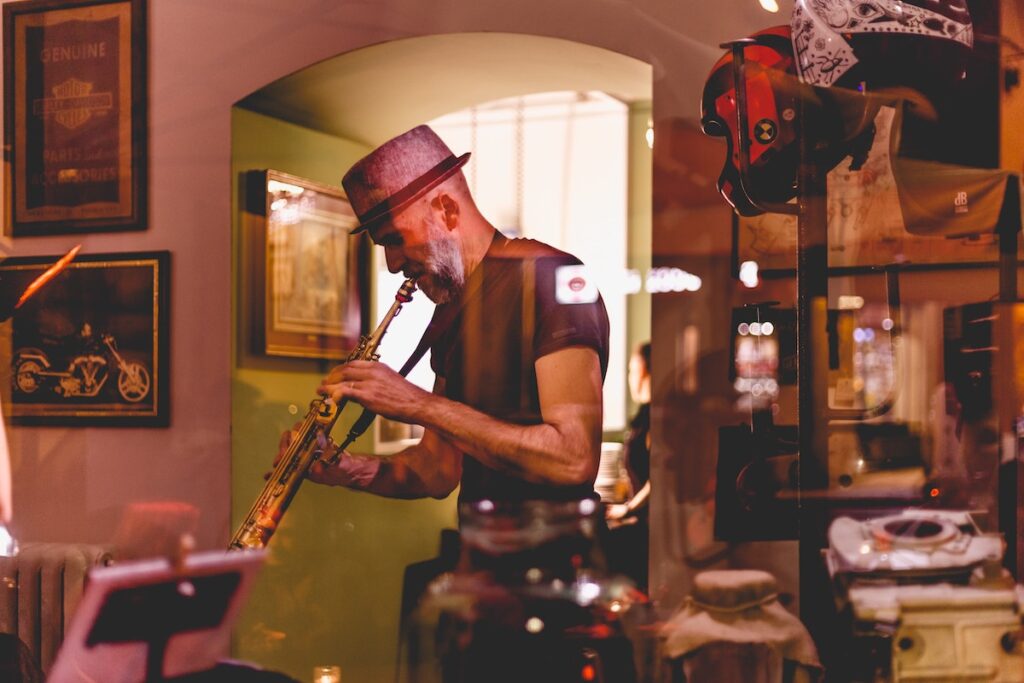man blows clarinet in bologna
