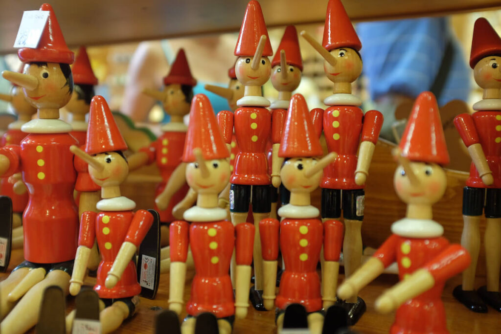 Pinocchio toys in front of a store in Florence
