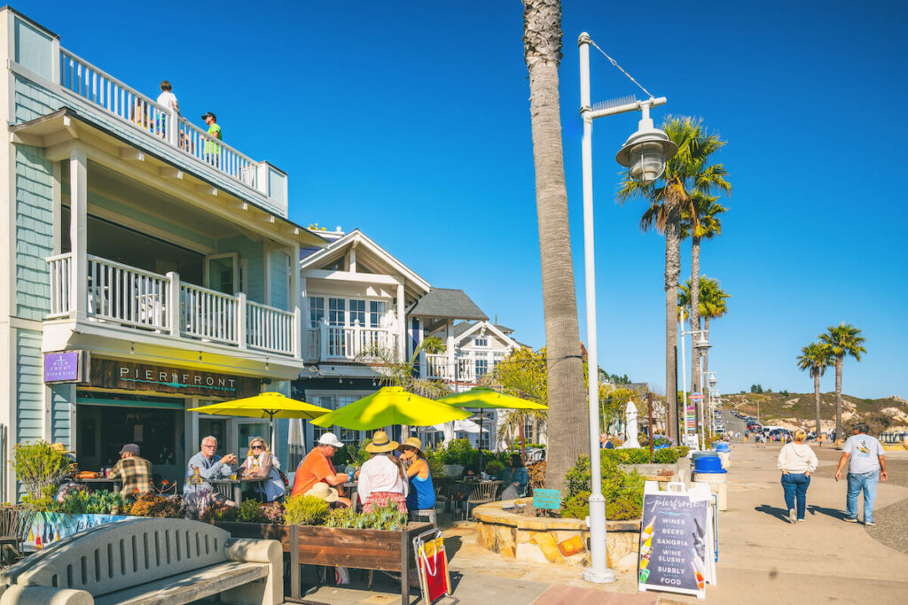 people hanging out at Avila Beach on a sunny day