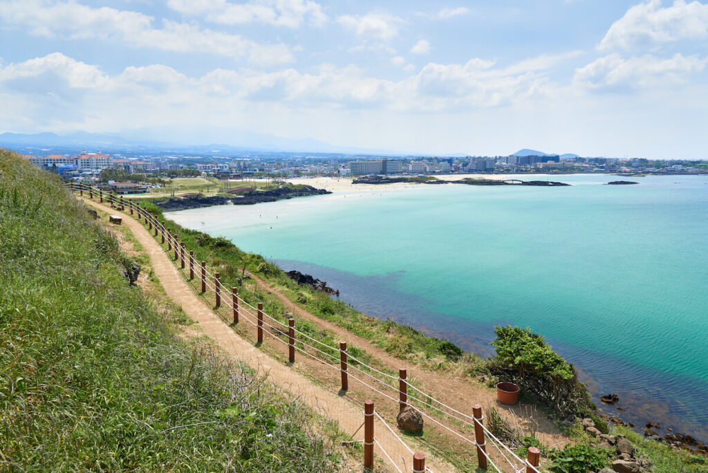 Hamdeok Beach in Jeju is famous for its clean and emerald-blue water