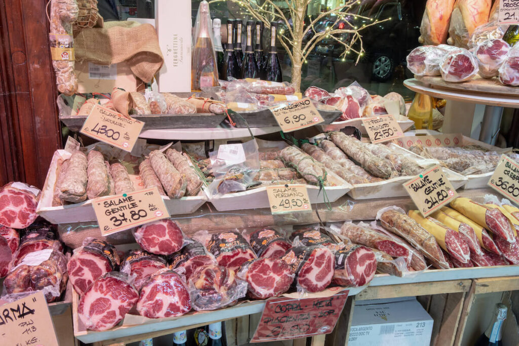 cold cuts with price tags on display in parma