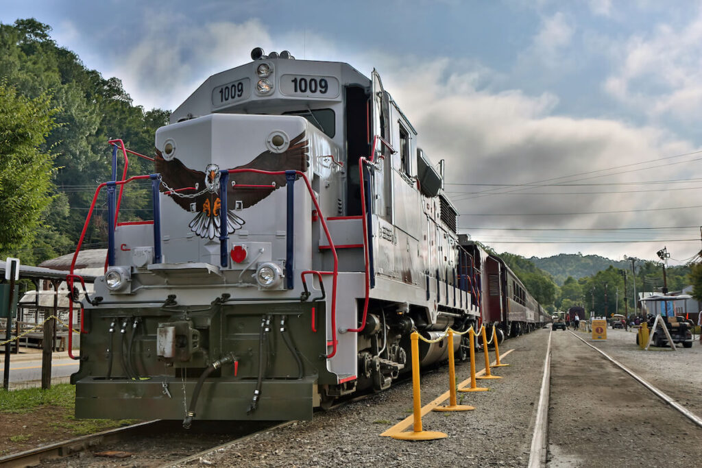 Great Smoky Mountain Railroad locomotive and train ready for departure from Bryson City