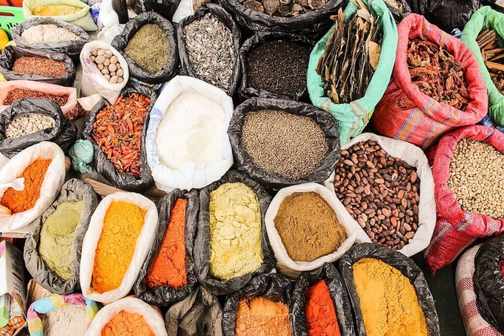 Assorted seeds and powders at market
