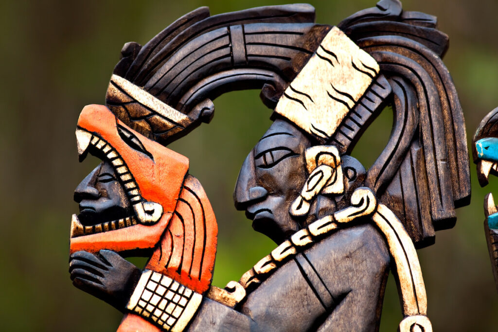 Maya deity wood carving