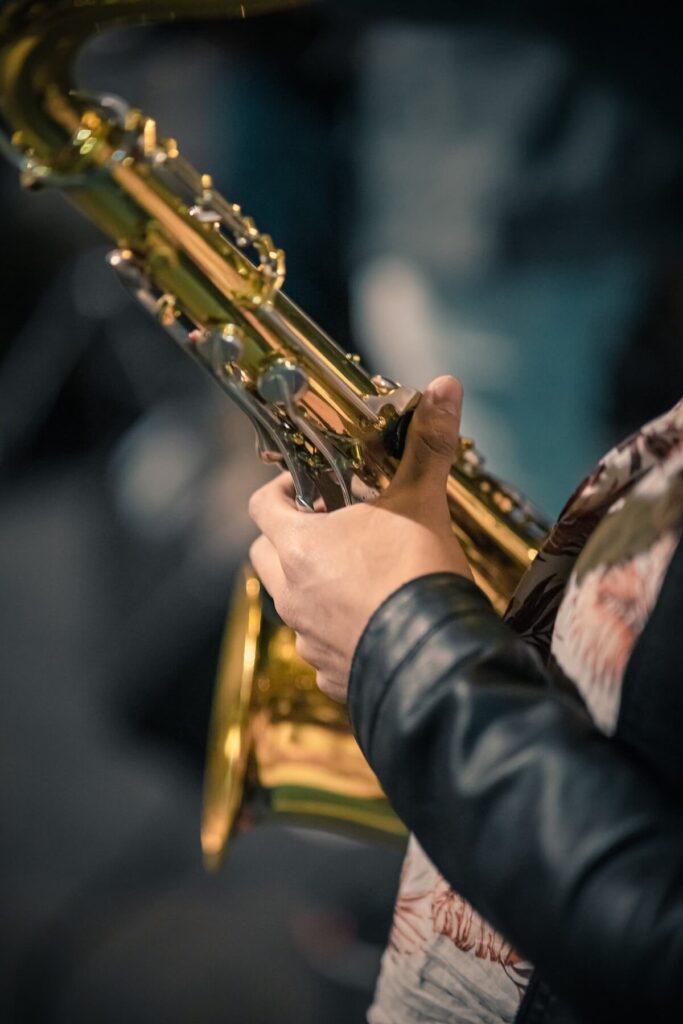 saxophone player is in the street