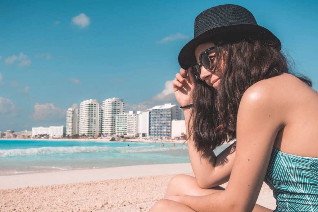 woman poses at Cancun beach
