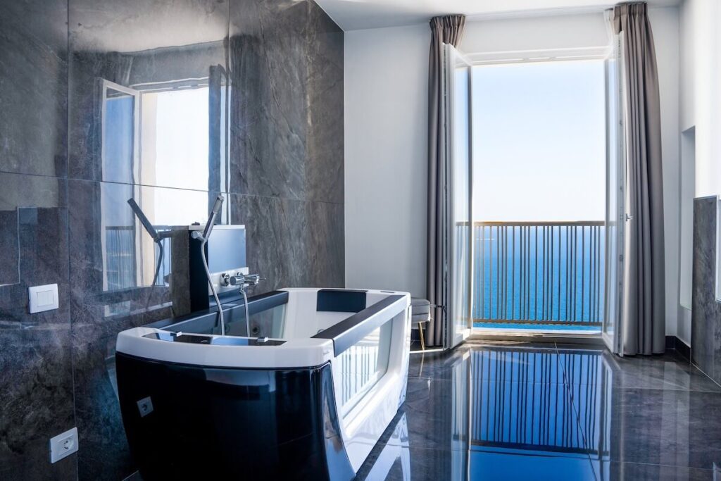 bathroom sea view at grand hotel serapide