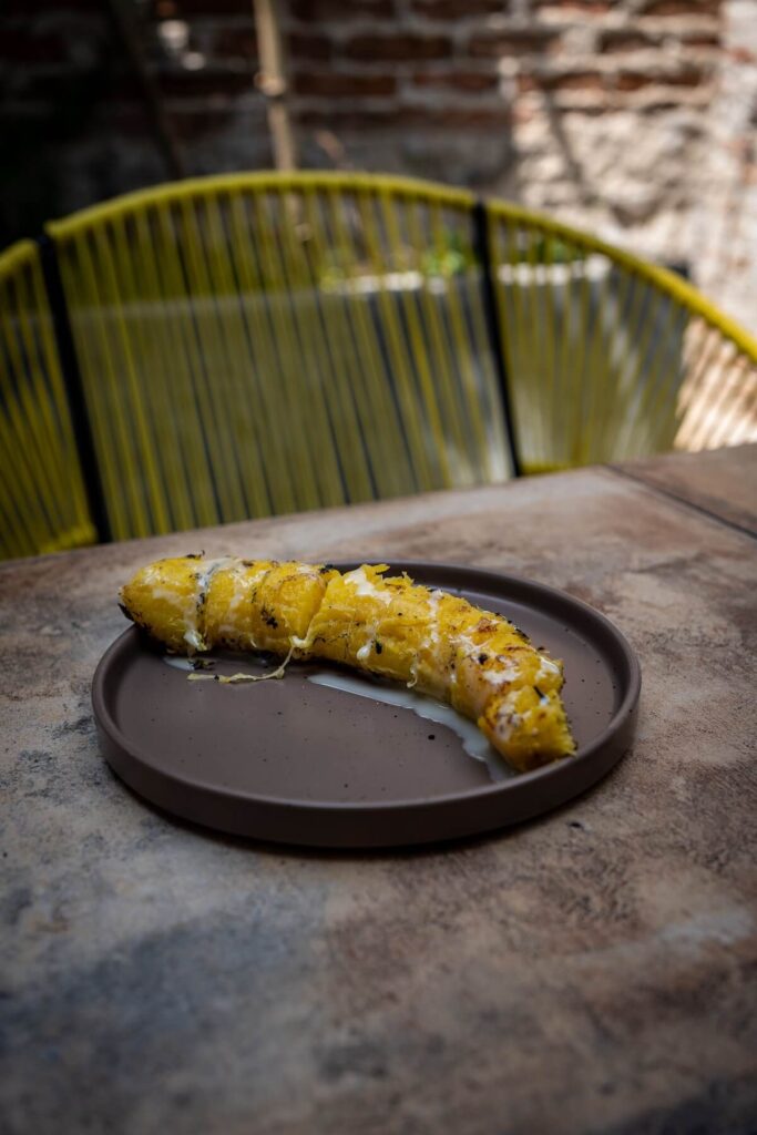 Grilled banana with condensed milk from Casa Tierra in Oaxaca, Mexico