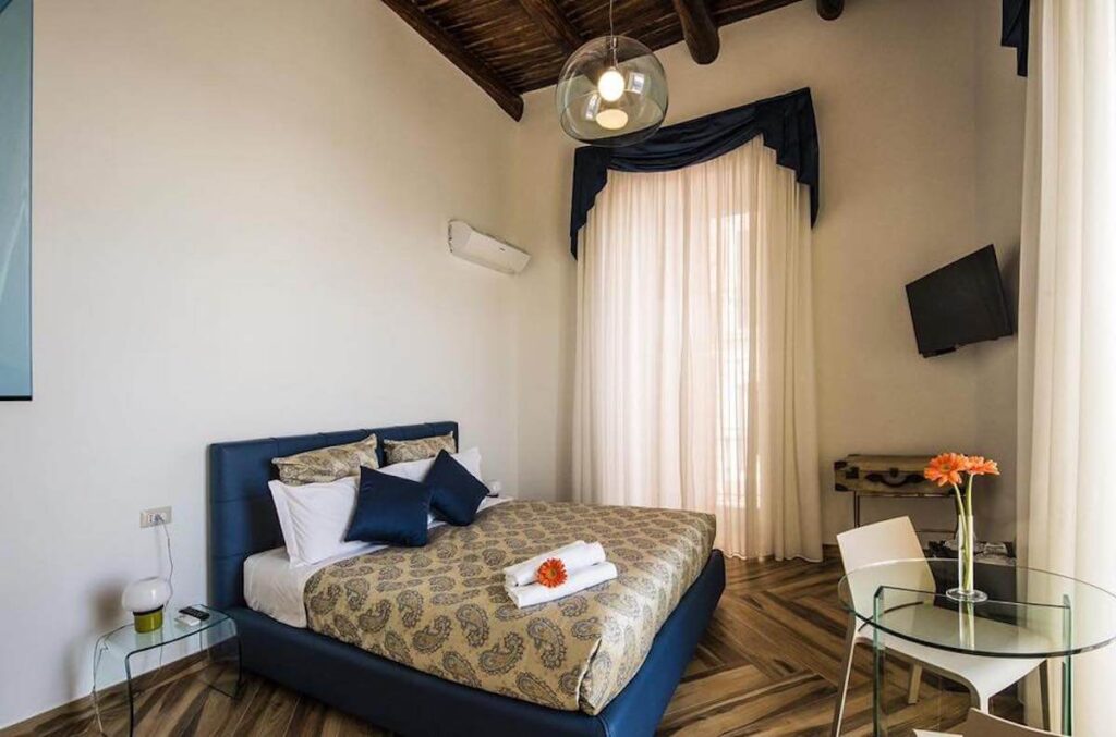 charming bedroom at mareluna suite de charme