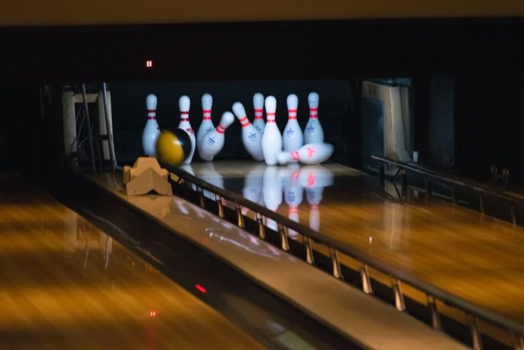 bowling pins tumbling down