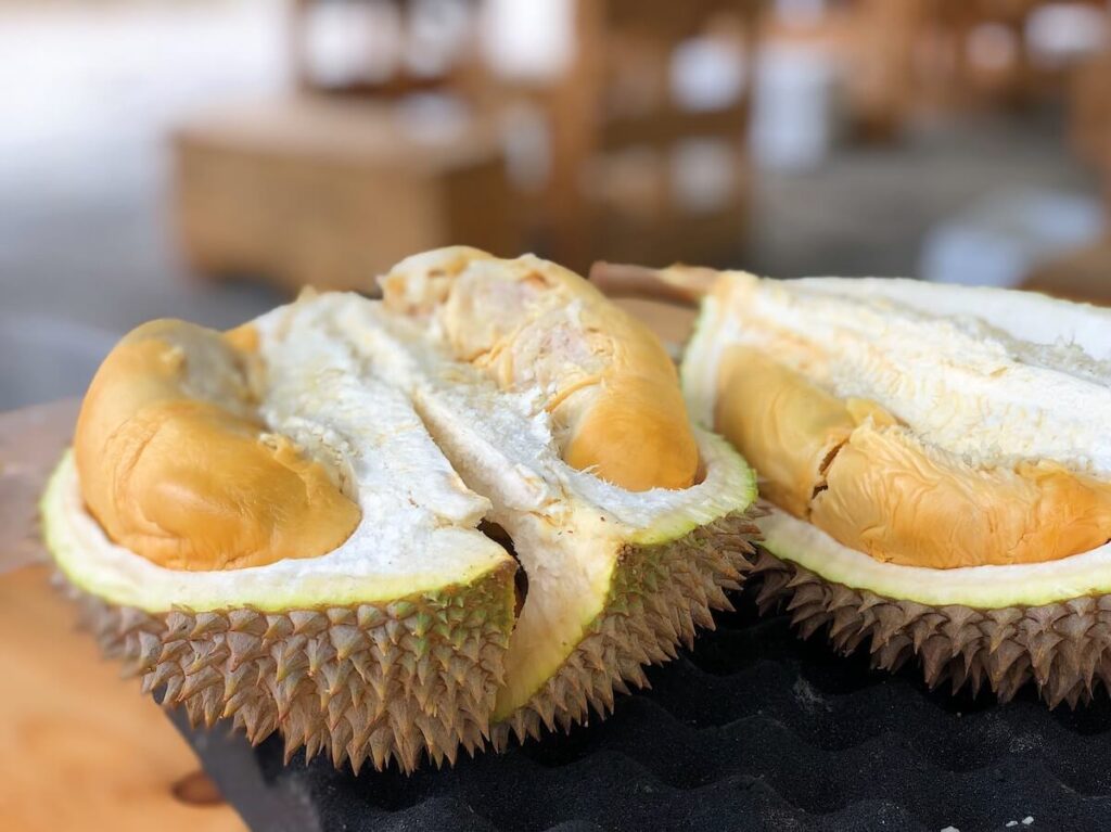 focus photo of sliced durian
