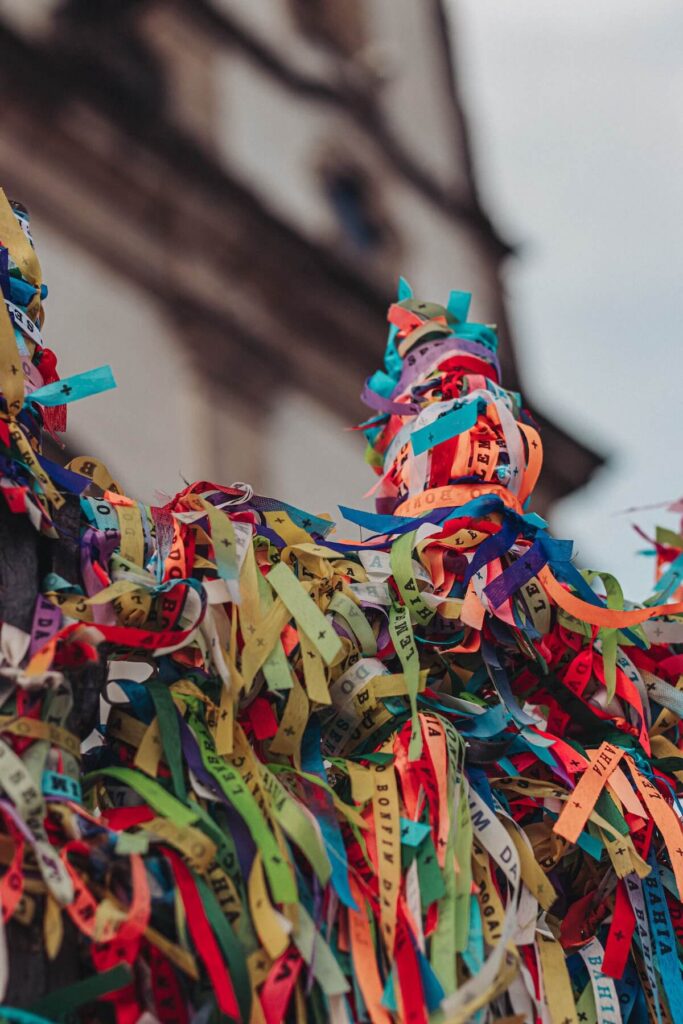 wish ribbons tied to bonfim church rails