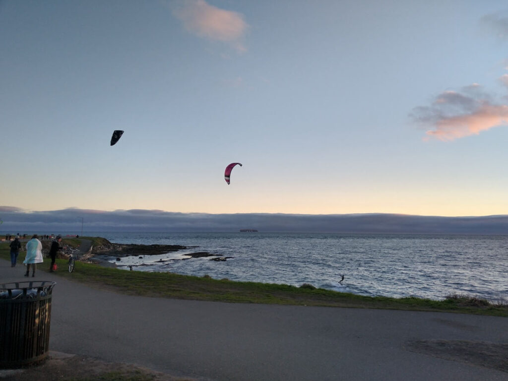 Kite surfers in Dallas Road Beach