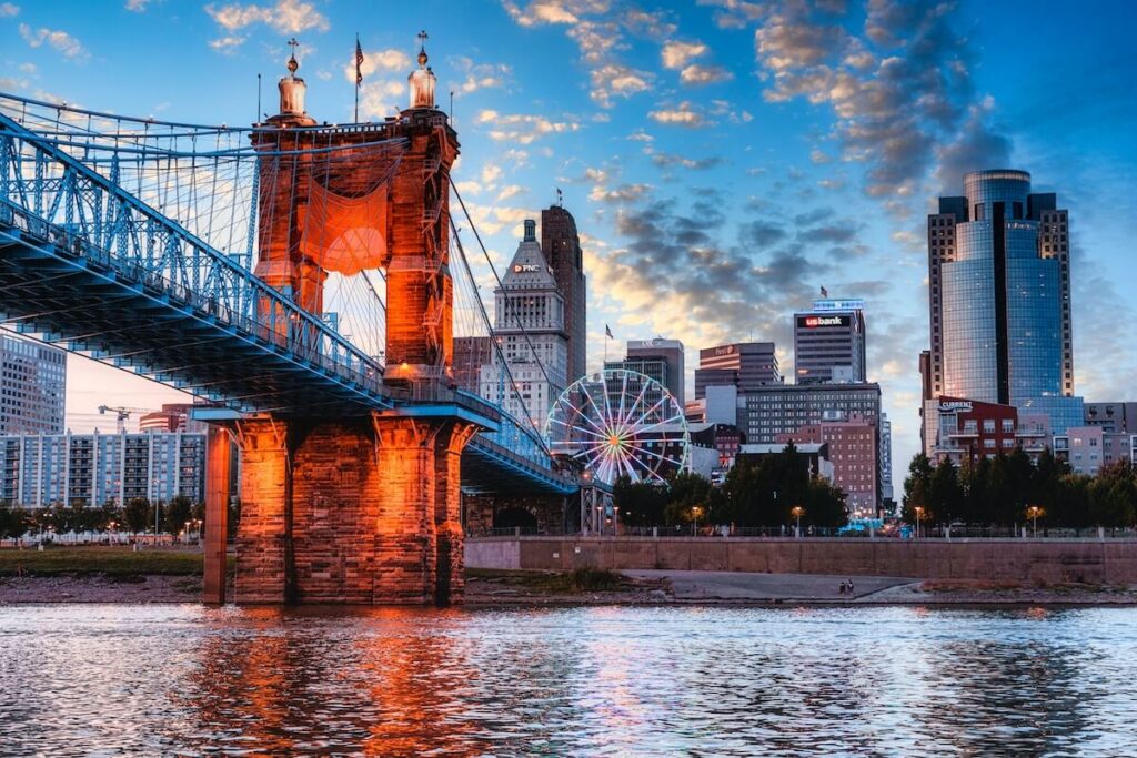 the John A. Roebling Suspension Bridge over Ohio River at dusk