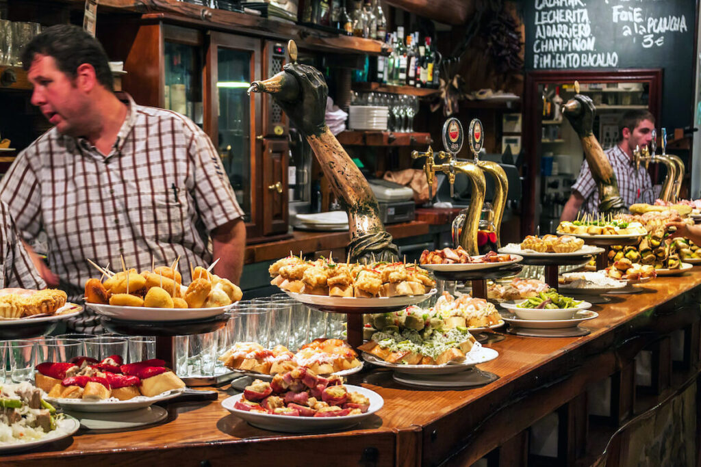 View of a bar with traditional pinchos in San Sebastian, Basque Country, Spain