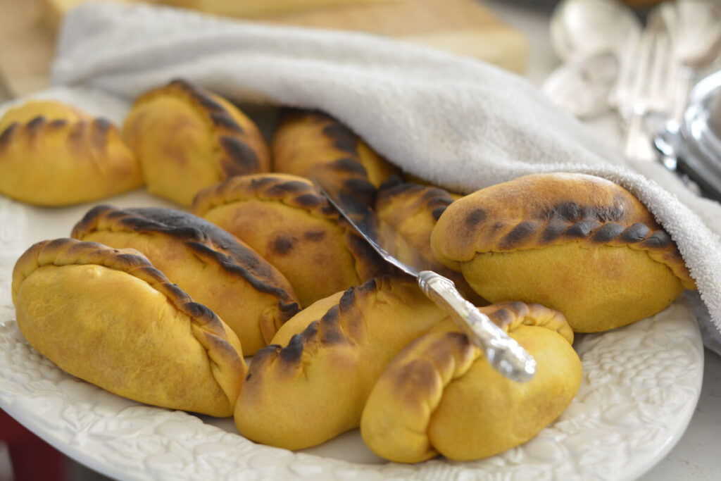 bolivian saltenas on plate