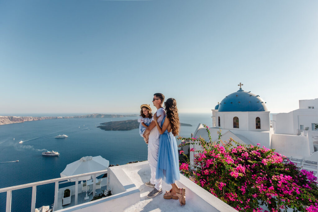 Family on vacation in Santorini, Greece