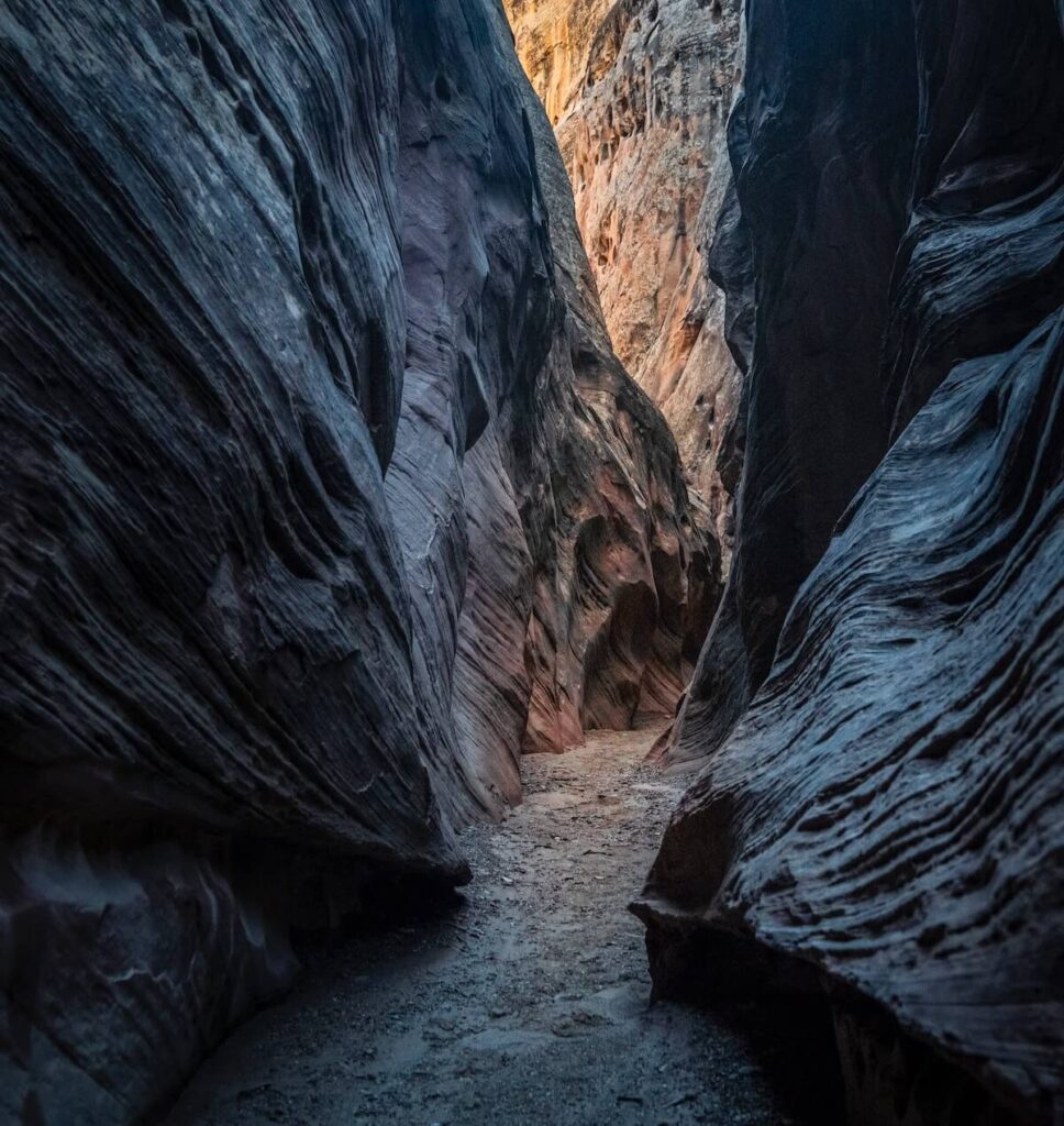 black and gray rock formations in Little Wild Horse Canyon, Utah