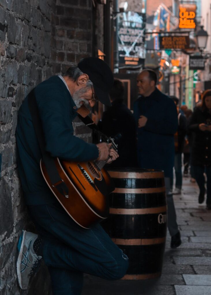 Man busking at Merchant's Arch, Temple Bar, Dublin