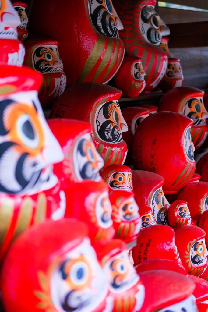 closeup of daruma figurines in Japan