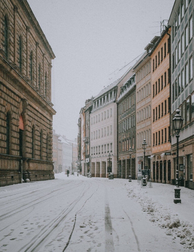 historic munich street on snowy day
