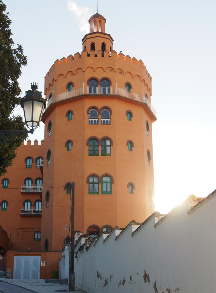 view of beautiful tower in Jewish quarter of Granada, Spain