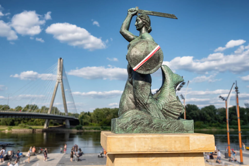 The Warsaw Mermaid called Syrenka on the Vistula River bank in Warszawa