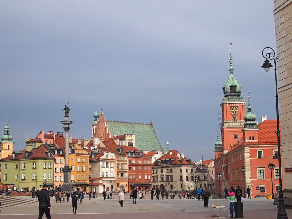people milling around Old Town in Warsaw