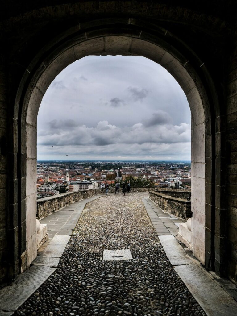walking through porta san giacomo in bergamo
