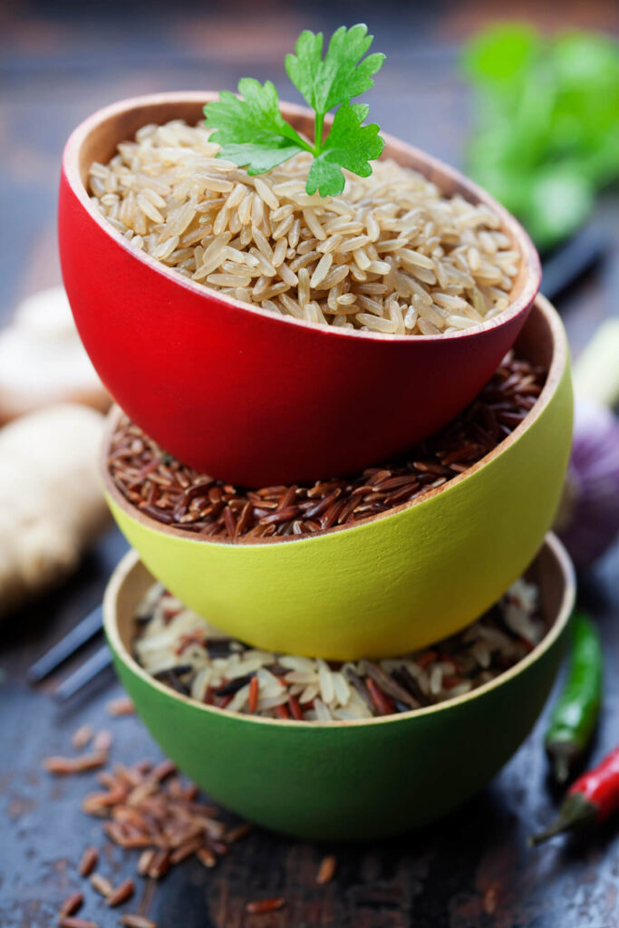 three bowls of uncooked rice