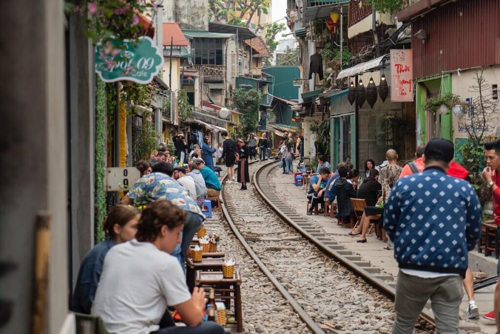 tourists hanging out at the Hanoi Train Street