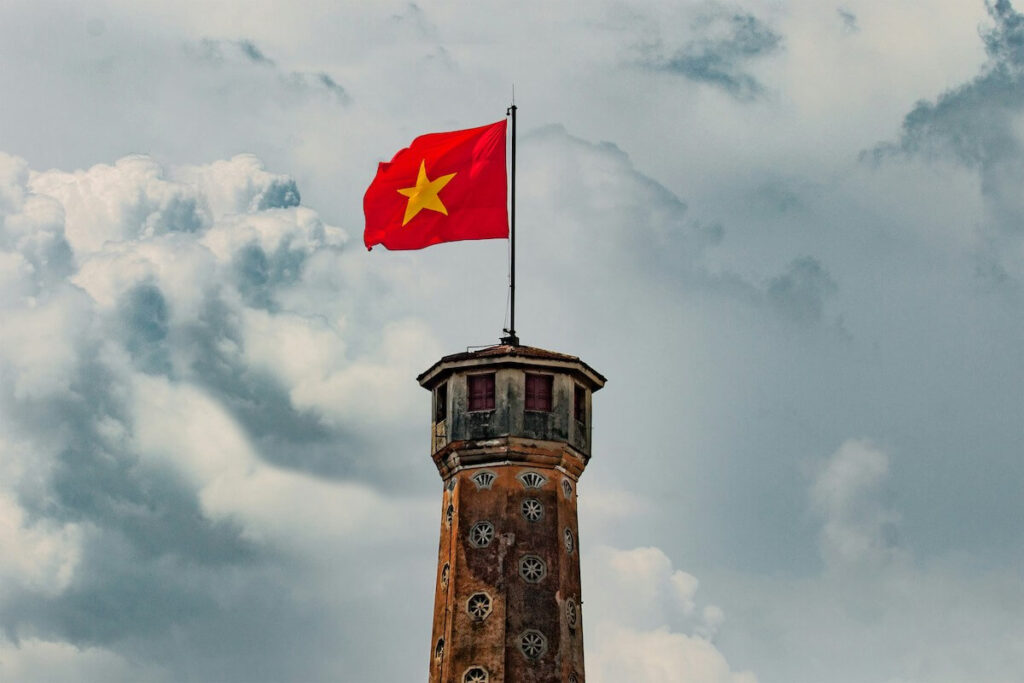 Vietnamese flag flying over Hanoi Flag Tower