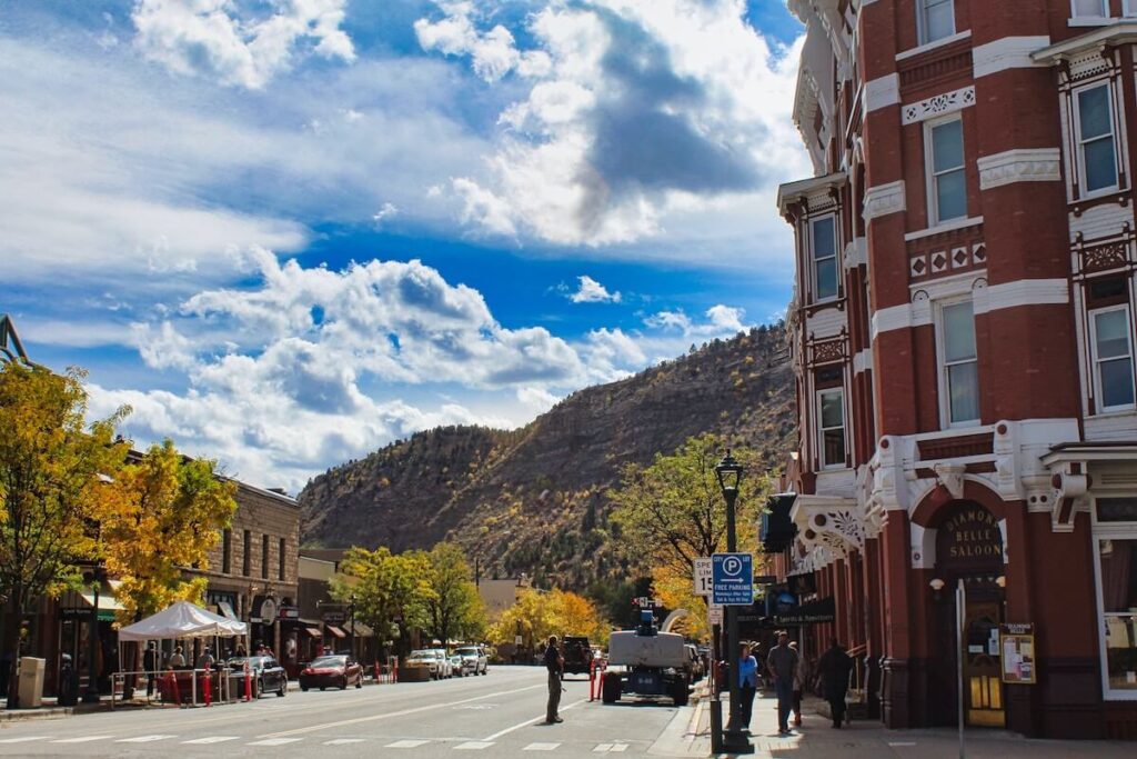Brick building on mountain town of Durango at fall