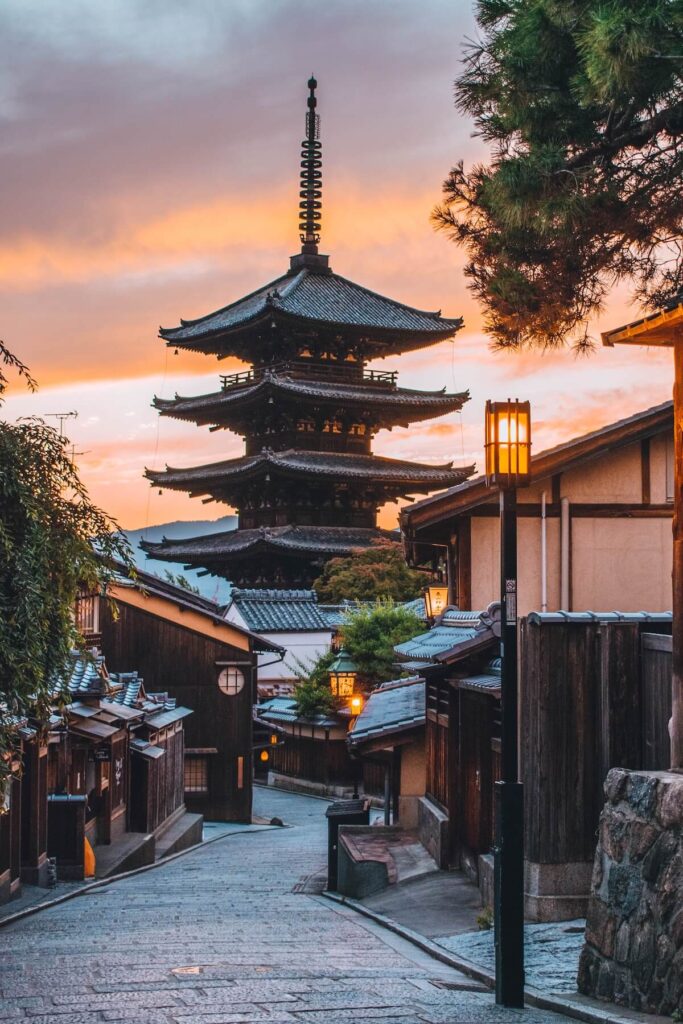 Japanese street in Kyoto at night in Japan with a pagoda