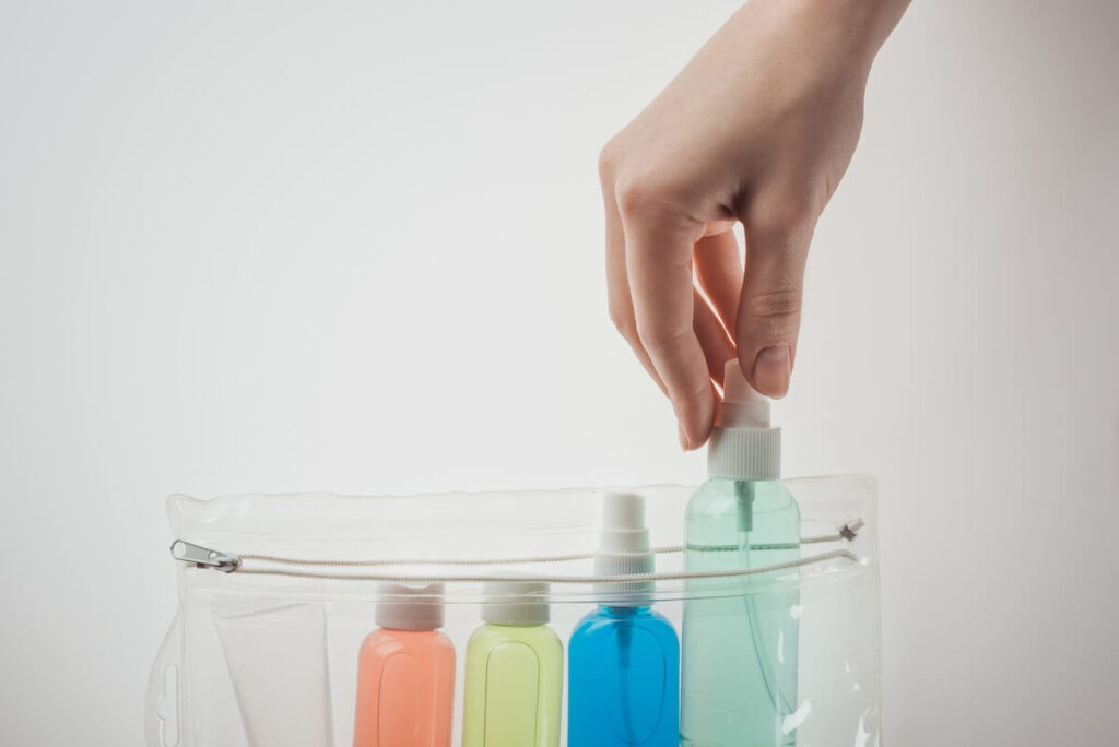 liquid bottles in a clear plastic