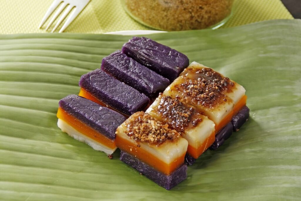 sapin-sapin, colorful Filipino rice cakes, on banana leaf