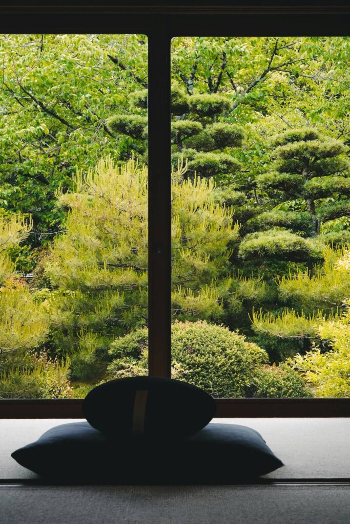 huge window at a tatami room overlooking a Zen garden