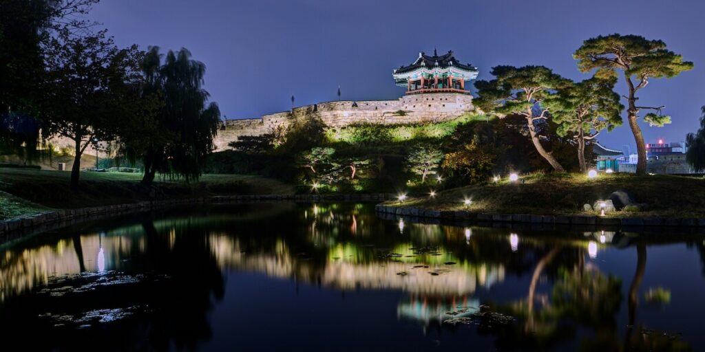 nighttime view of Hwaseong Fortress in Suwon