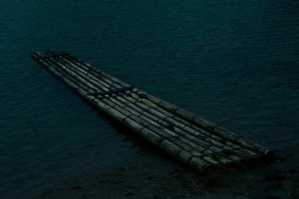 bamboo raft floating in water