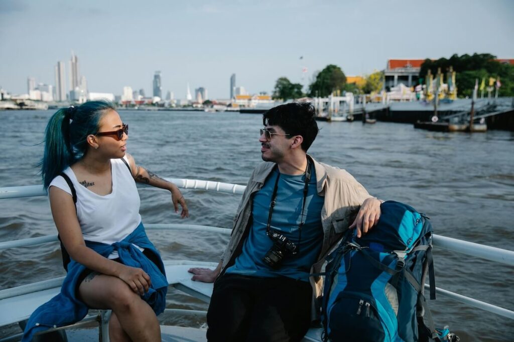 bangkok aboard a boat cruising through Chao Phraya River in Bangkok